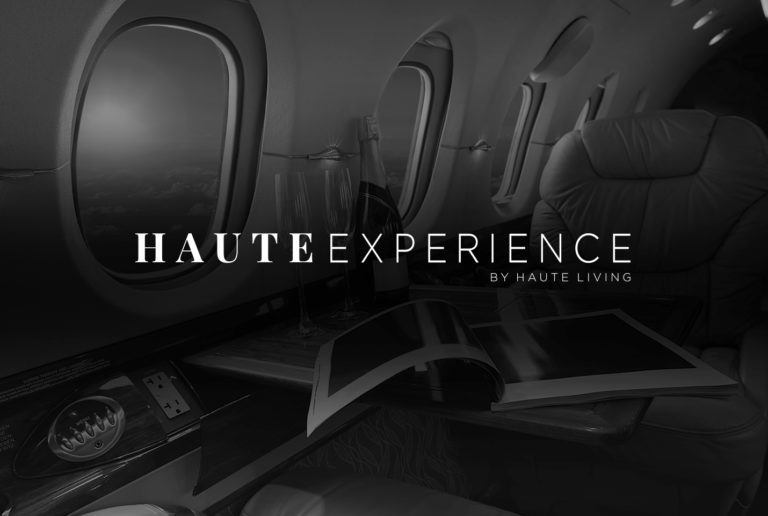 Haute Experience by Haute Living logo mockup on airplane interior image