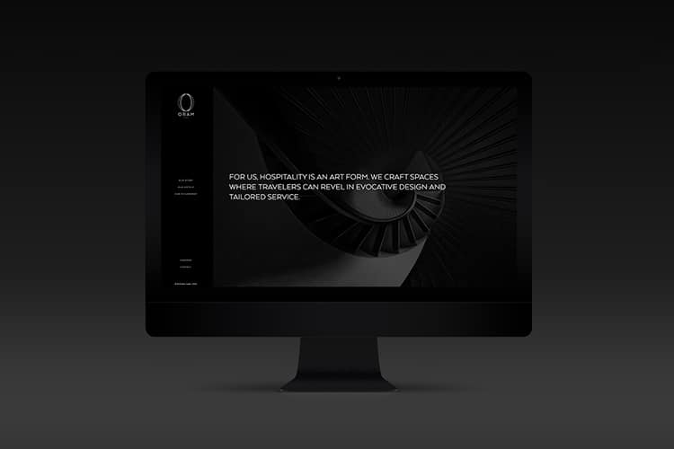 Oram Hotels website home page mockup on dark apple iMac